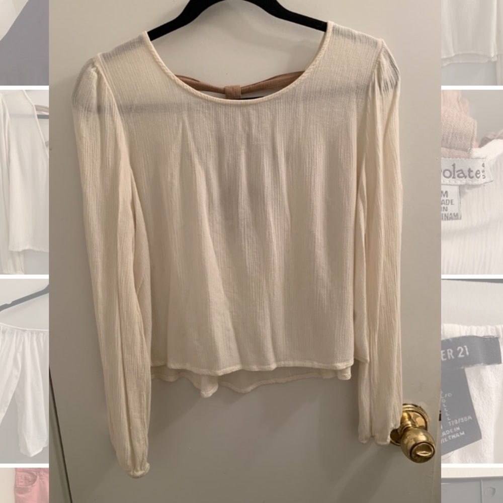 Cream top with detailed back